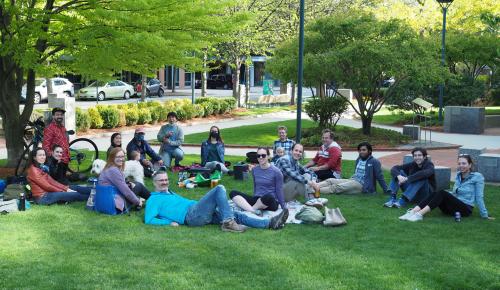 Group of team members at an outdoor happy hour event