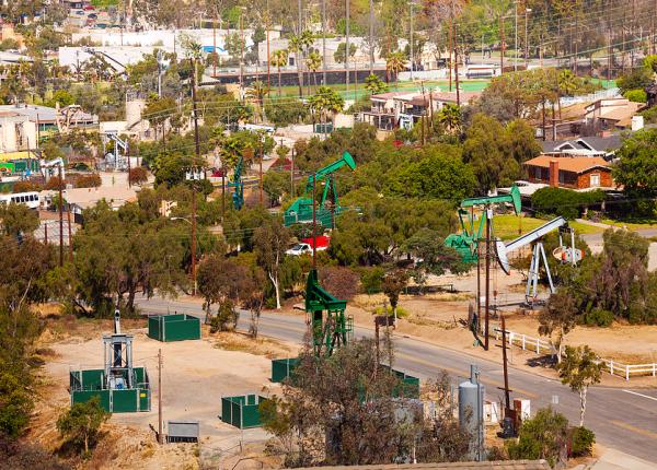 Oil pumps in residential neighborhood in Long Beach St California