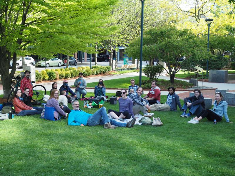 Group of team members at an outdoor happy hour event